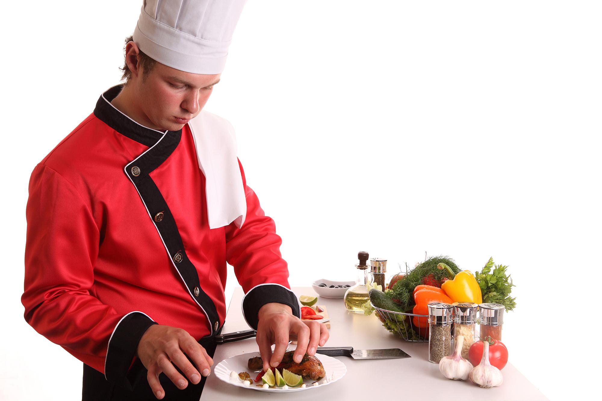 Founder preparing a meal in a small warm kitchen