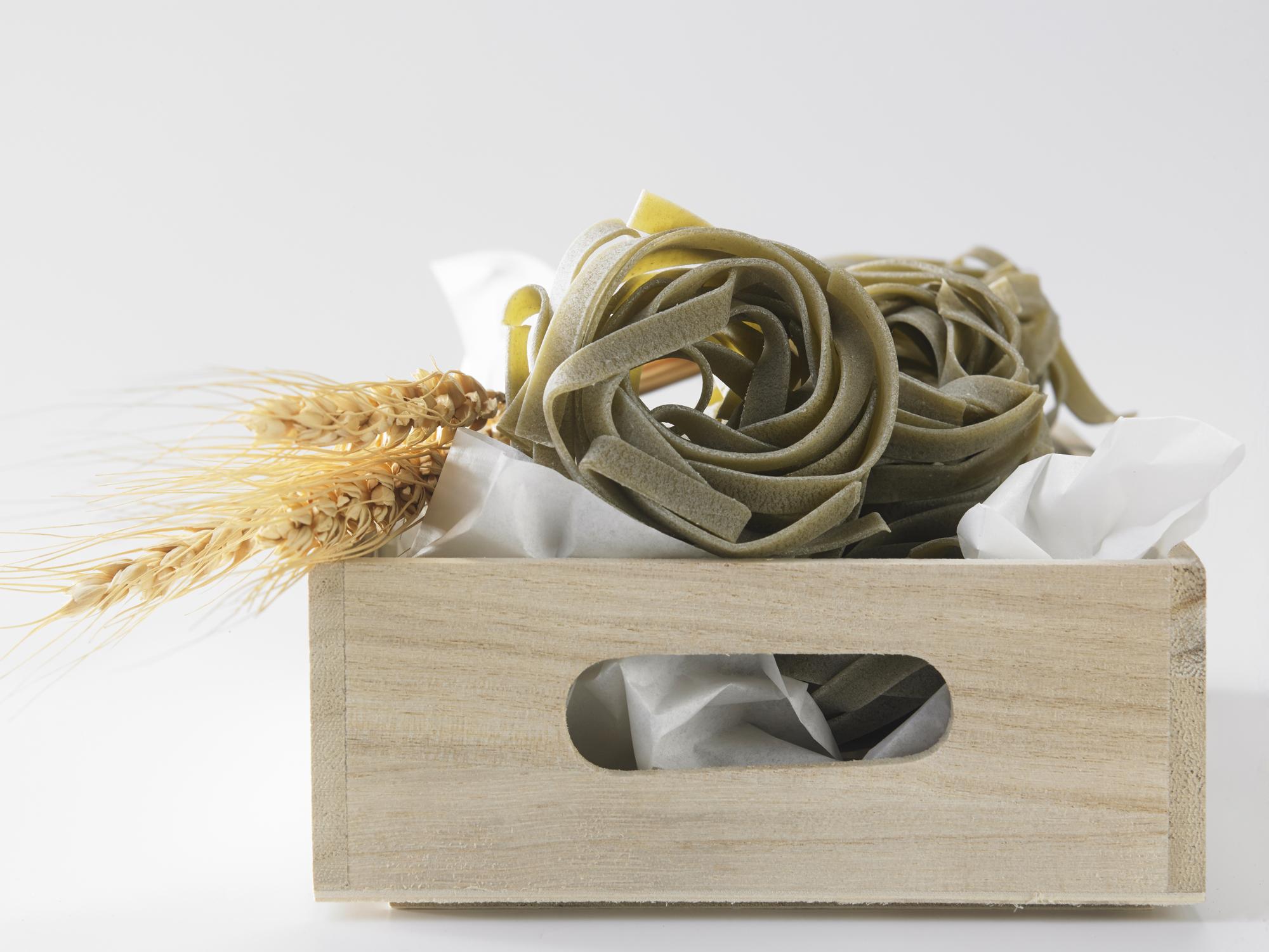 Close-up of crafted pasta with herbs